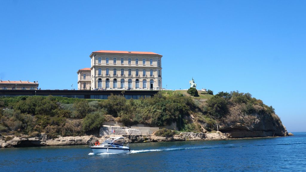 The park and palace 'le Pharo', seen from a boat in the harbour