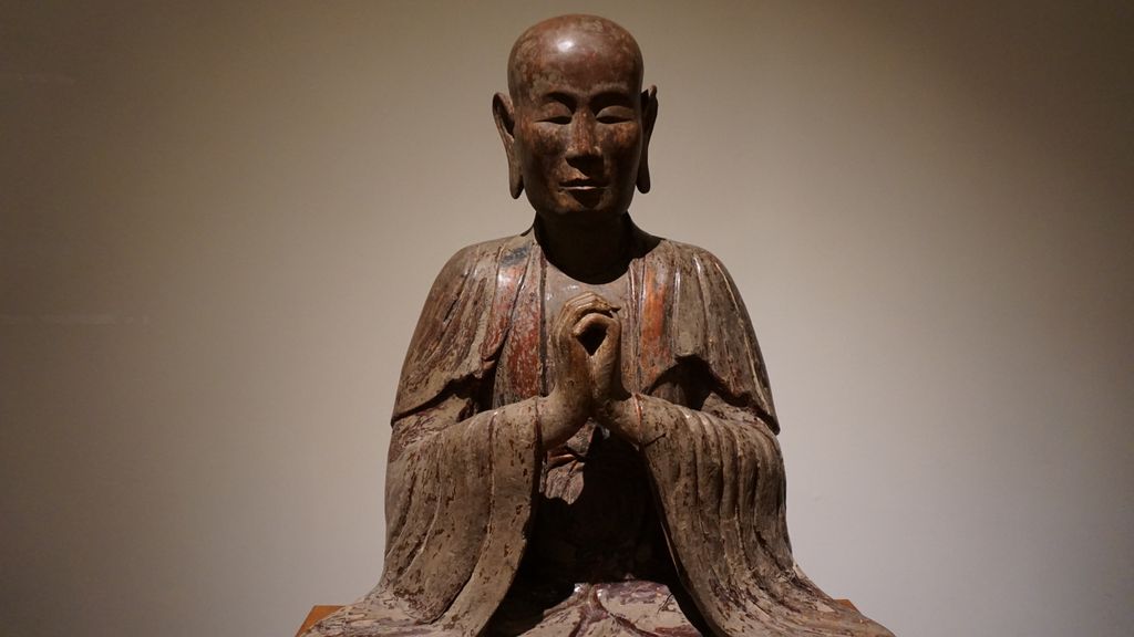 At the Musée Guimet, Paris (statue of a sitting monk, China)